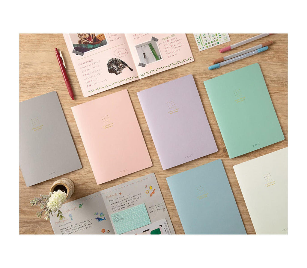 Midori A5 dot grid blue notebook stationery flat lay