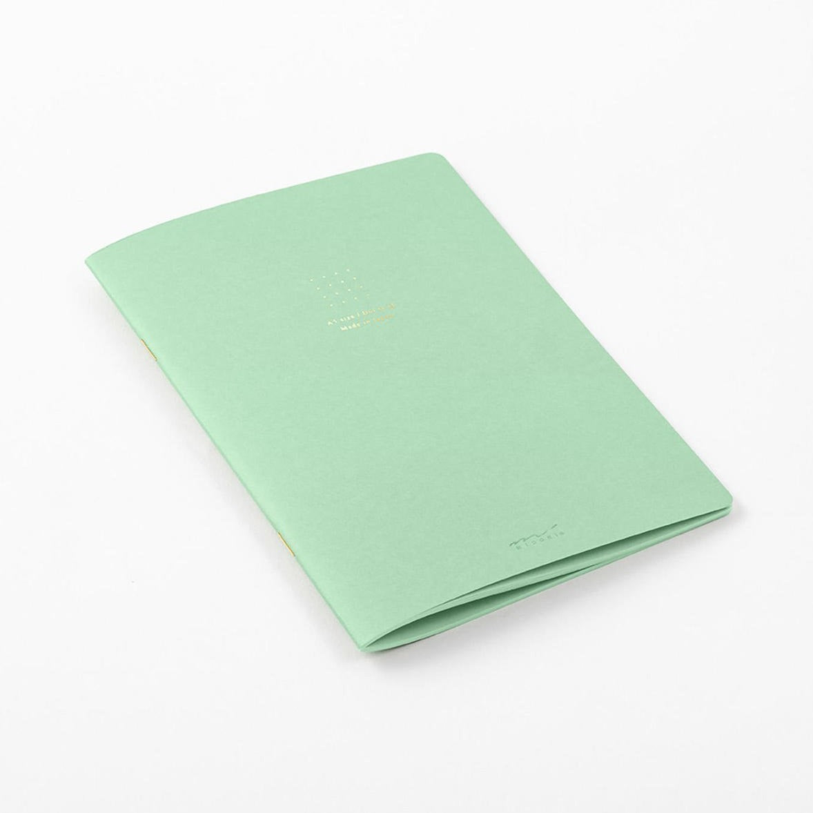 Midori A5 green dot grid notebook cover close-up