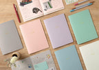 Midori A5 pink dot grid notebook lifestyle flat lay