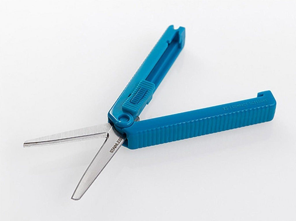 Midori blue compact scissors open showing retractable blades