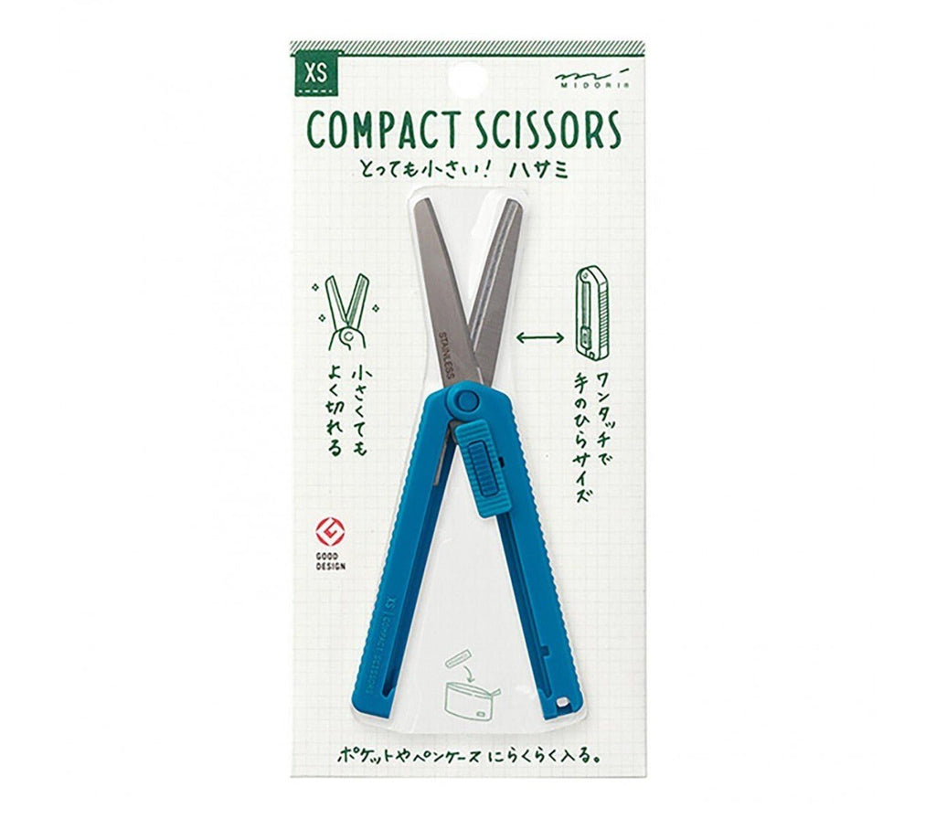 Midori blue compact retractable scissors in hand