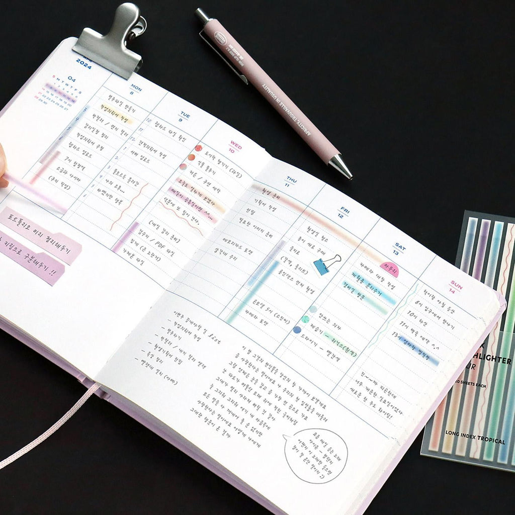 Iconic highlighter stickers tropical blur in use on planner