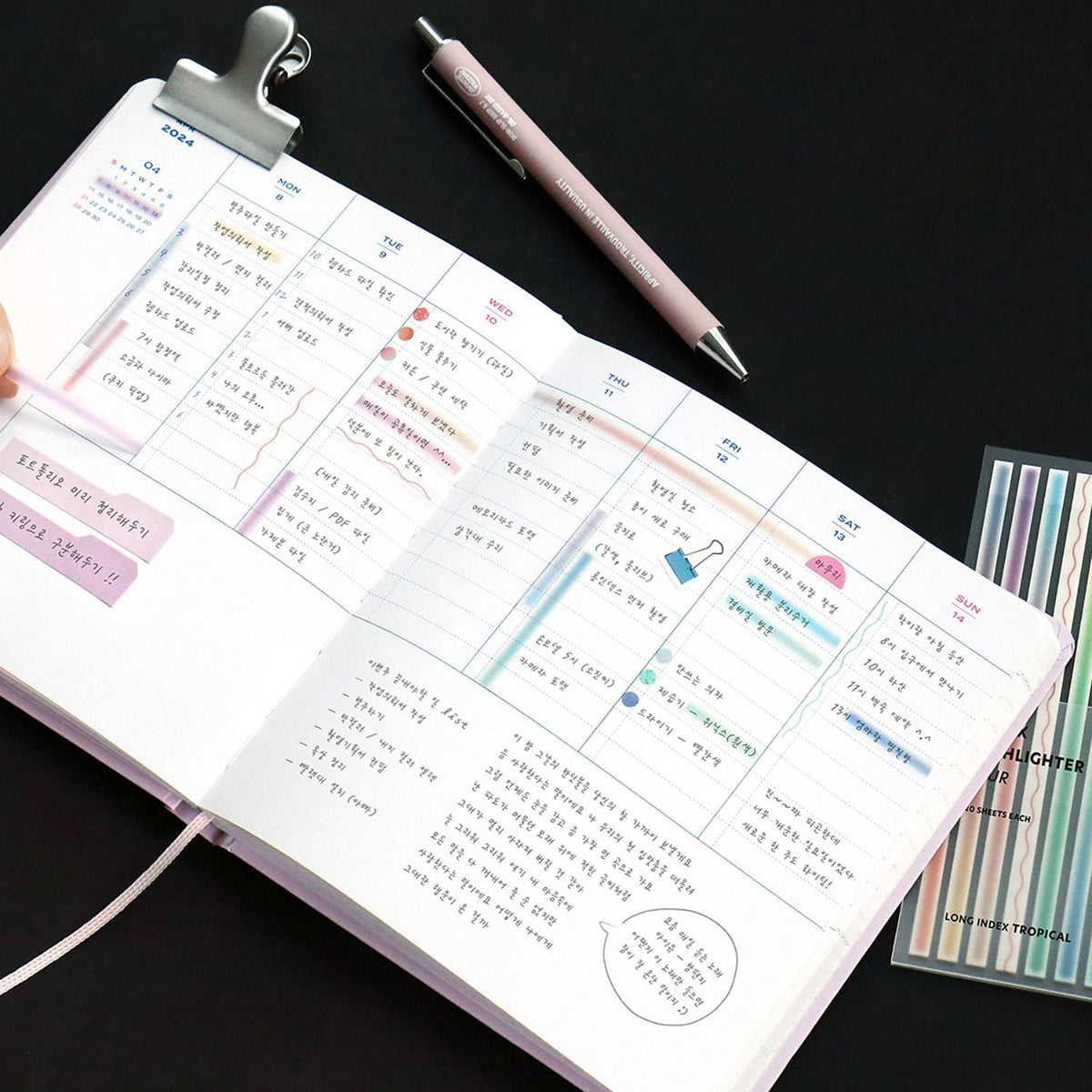 Iconic highlighter stickers tropical blur in use on planner