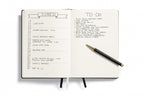 Leuchtturm1917 teal Bullet Journal open showing dotted pages
