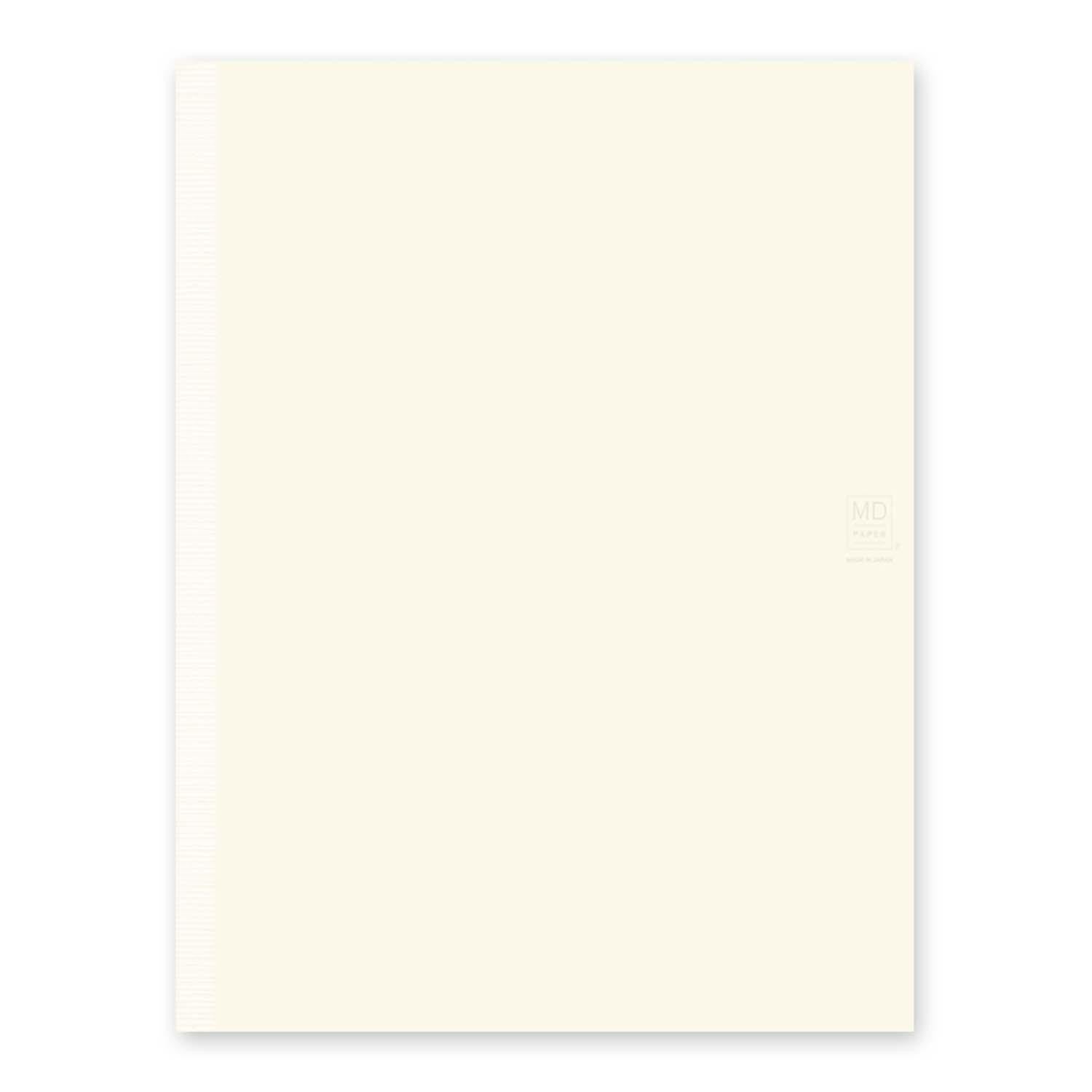 Midori MD Paper A4 notebook lifestyle flat lay on desk