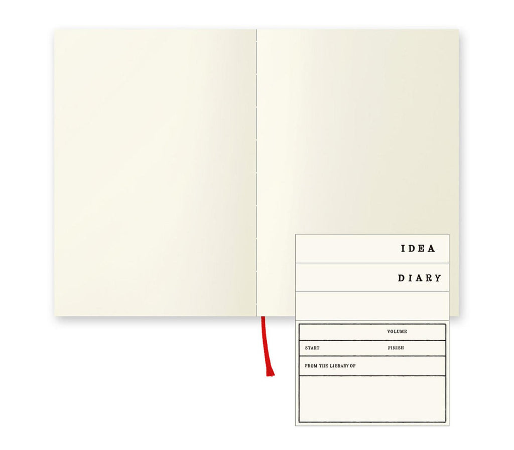 Midori MD Paper A6 notebook with pen writing