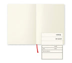 Midori MD Paper A6 notebook with pen writing