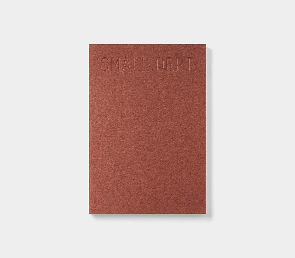 Trolls Paper red brick sketch journal open showing blank pages