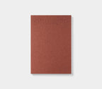 Trolls Paper red brick sketch journal open showing blank pages