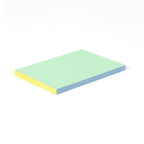 Labobratori pink green notebook with pen writing