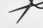 Tools to Liveby black scissors blades close-up