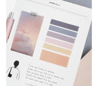 Iconic sunset index sticky notes fanned out showing colours