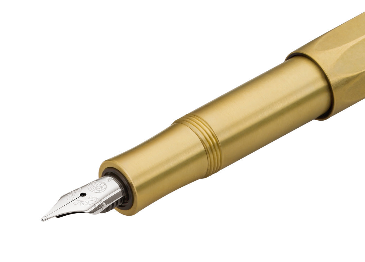 Kaweco Brass Sport fountain pen in hand writing