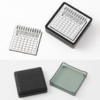 Midori calendar stamp impression on paper showing date grid