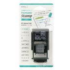 Midori rotating list stamp lifestyle shot with notebook