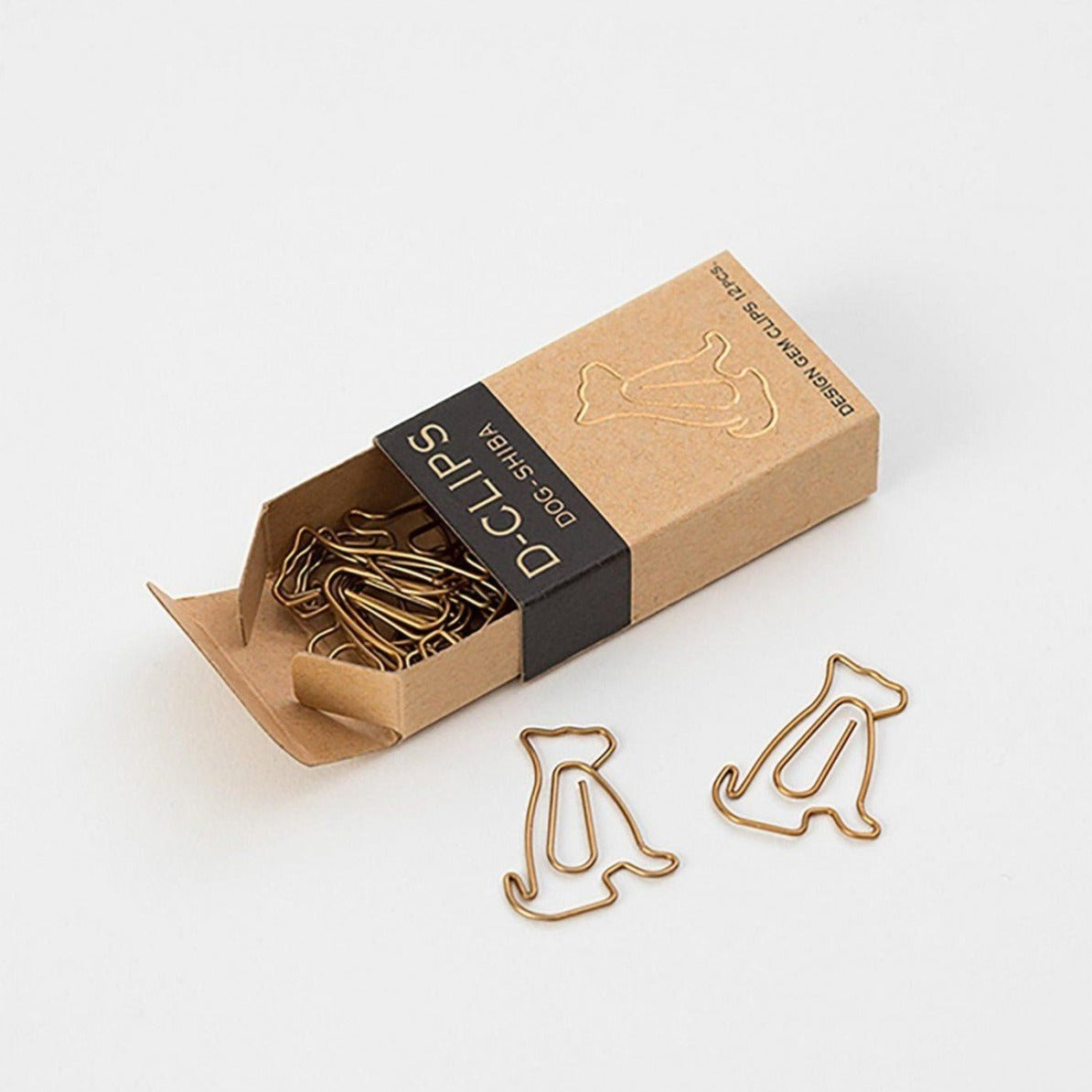 Midori Shiba dog paper clips in use on notebook pages